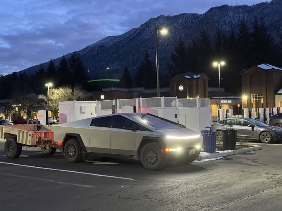 Tesla Supercharging the Cybertruck while towing the M1101 Military Trailer.